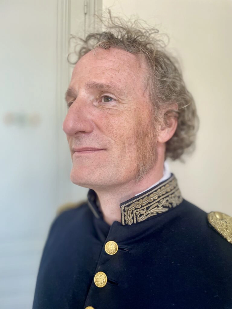 Justine Fiorito Film makeup including sideburn styling Makeup created by Justine Fiorito, including sideburn adjustments for a male character on set.