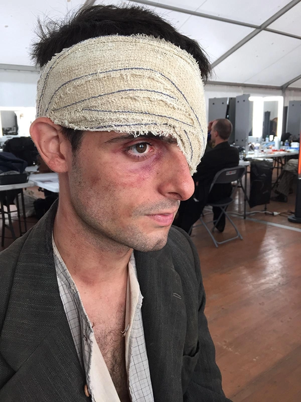 Justine Fiorito at work on special effects makeup during the filming of The New Look Justine Fiorito at work on special effects makeup during the filming of the TV series *The New Look*.